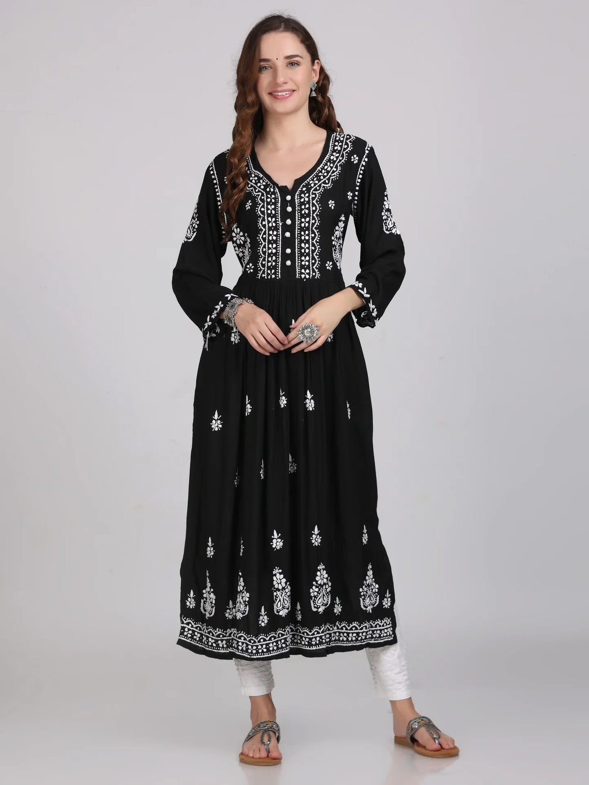 Model wearing Chikankari kurti with pockets, black with hand embroidery