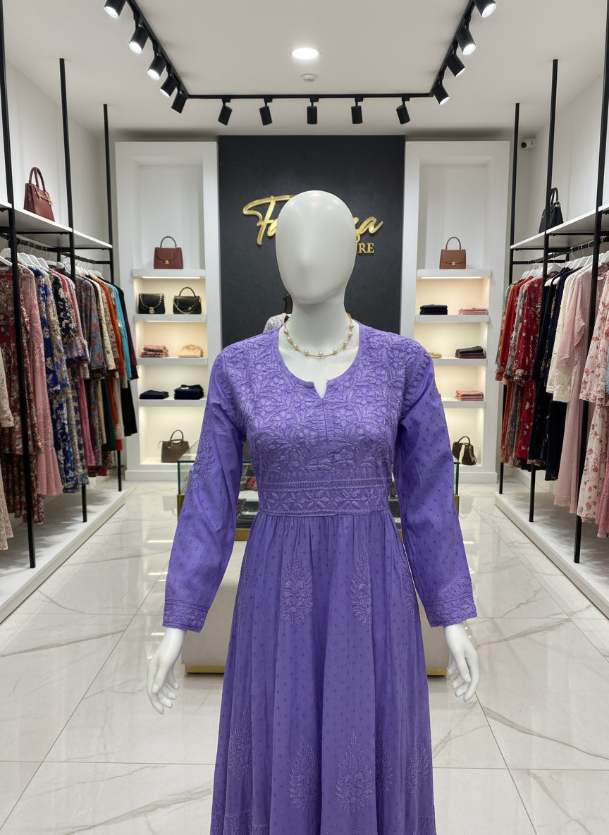 Purple textured garment on a mannequin 