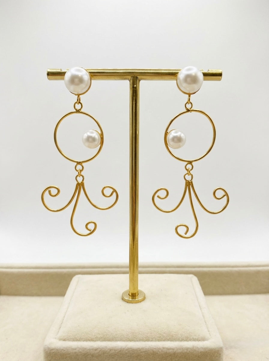close-up-of-handcrafted-brass-dangle-earrings