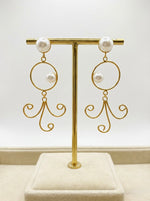 close-up-of-handcrafted-brass-dangle-earrings