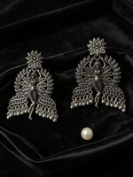Rear view of dancing fairy doll oxidised silver statement earrings showing secure push-back closure and durable finish
