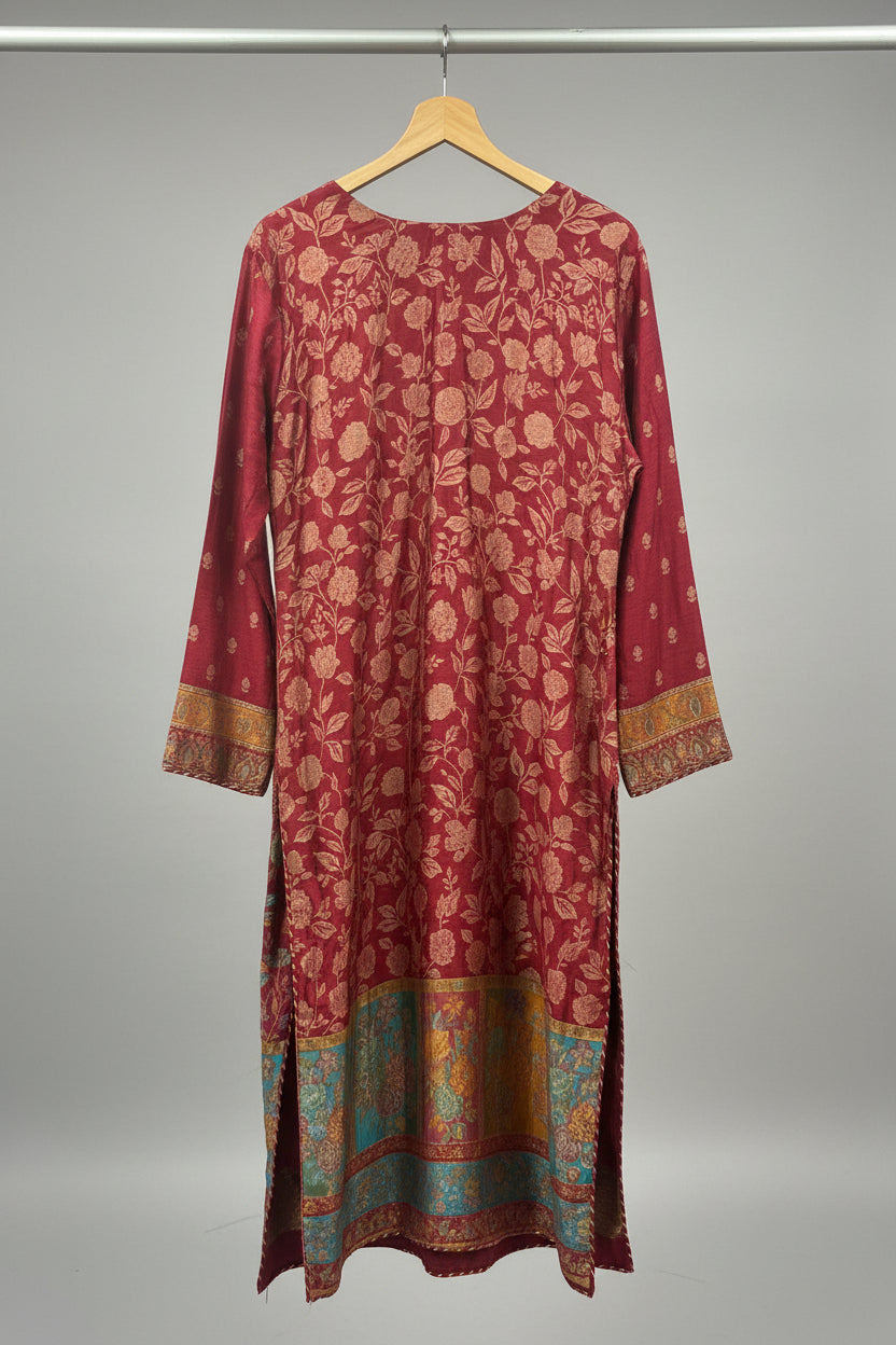 deep maroon colour rear view of kanni silk kurti is displayed in this image. 