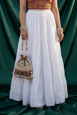 Close-up view of the flexible elastic comfort waistband on the premium white Chikankari skirt, stretching from 28 to 50 inches.