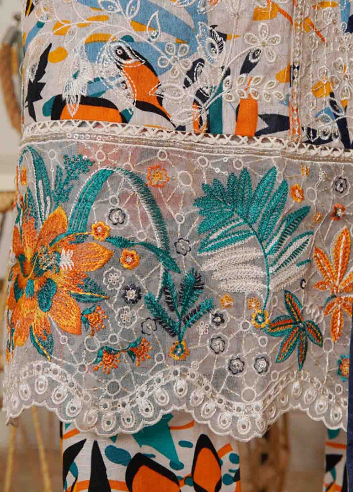 Detailed view of embroidered front panel on Pakistani khaddar dress