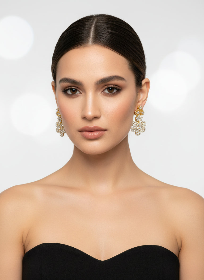  golden plated with white American diamond stone earrings by famaza couture 