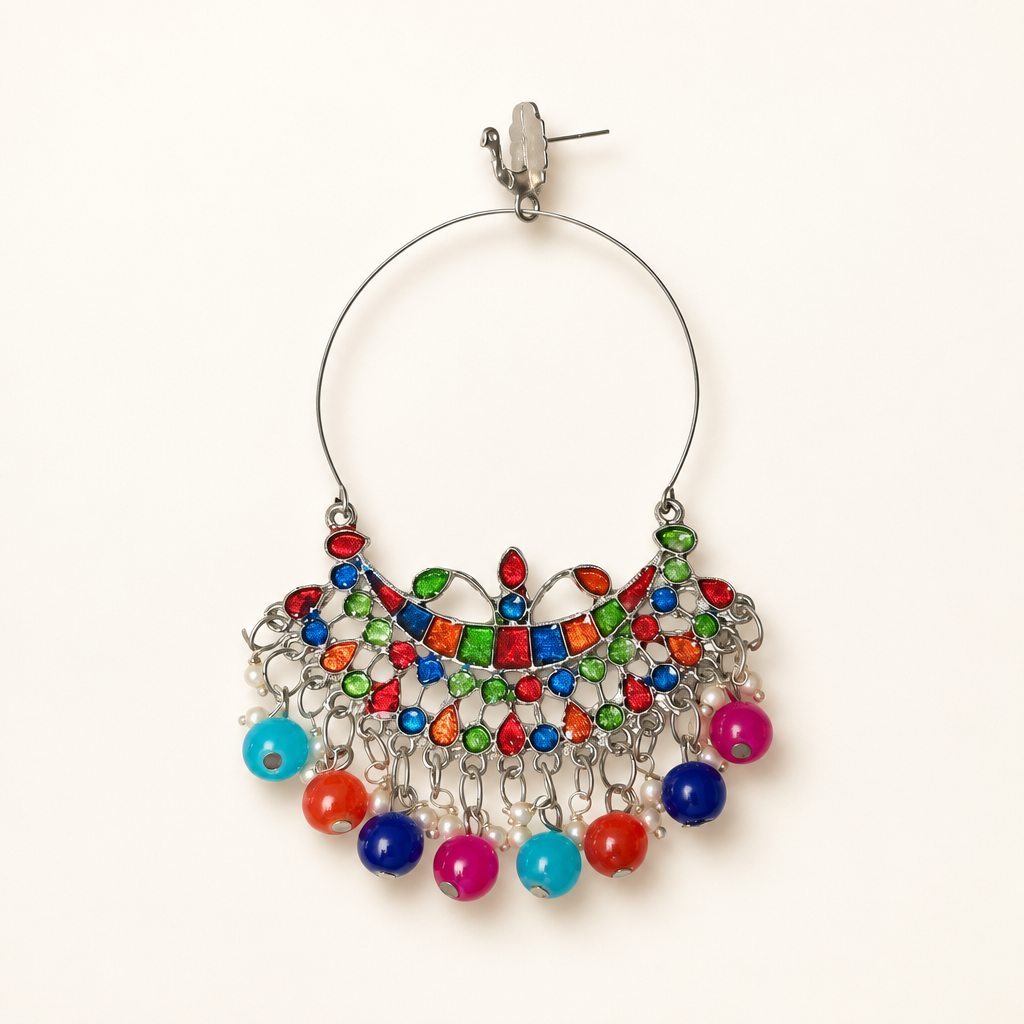 Silver-tone Chandbali hoop earring with multicolour enamel and colourful bead drops on a pearl-white background.