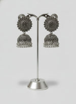 Silver oxidised jhumka earrings close up