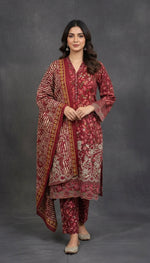 Soft khaddar material detail of traditional Pakistani embroidered suit