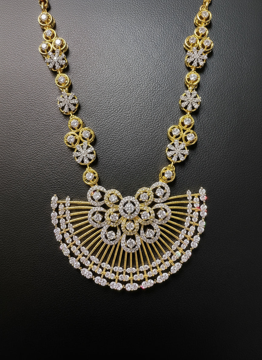 long necklace Gold plated with silver and golden polished and white and golden stones of American diamondsby famaza couture 