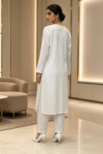 Full-length styling view of the luxury premium White Rayon Chikankari 2pc straight-cut kurti and trouser suit set