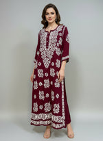 maroon colour modal fabric 46 inches long kurti with white hand embroidery on all over the kurti and sleeves. 