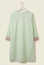 Back view of a mint green kurta on a white hanger, showing its plain back and pink embroidered cuffs