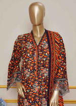Model wearing beautiful Pakistani khaddar embroidered 3pc suit for Eid party wear