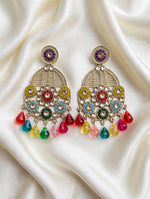 Pair of antique gold-tone teardrop earrings with purple stud tops, multicolour floral detailing and colourful drops on cream satin.