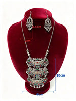 Peacock Radiance set measurements: pendant section 10 cm long and 6 cm wide; hook earrings 5.5 cm long and 2 cm wide.