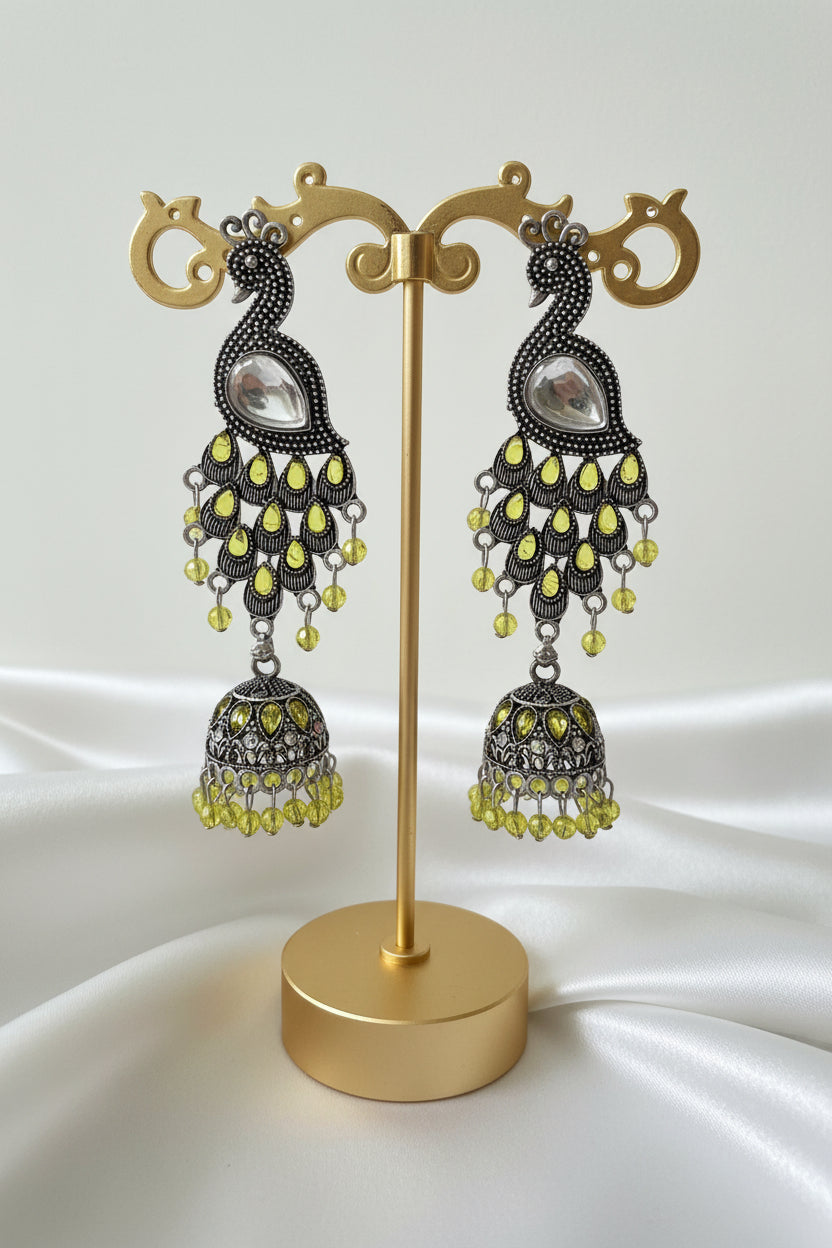 peacock figure oxidised long earrings 