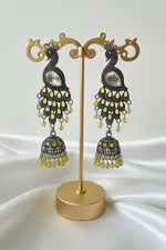 peacock figure oxidised long earrings 