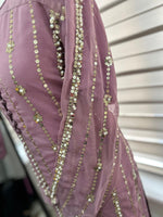 Close-up of the Shan-e-Sheeba lavender chiffon dupatta border with sequins and pearl embellishments beside the embroidered shirt.