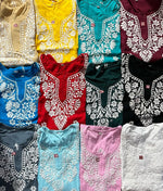 Model wearing white floral motif Chikankari kurtia