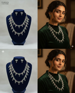 Jewelry set on a blue stand and worn by a model with 'Famaza Couture' branding.