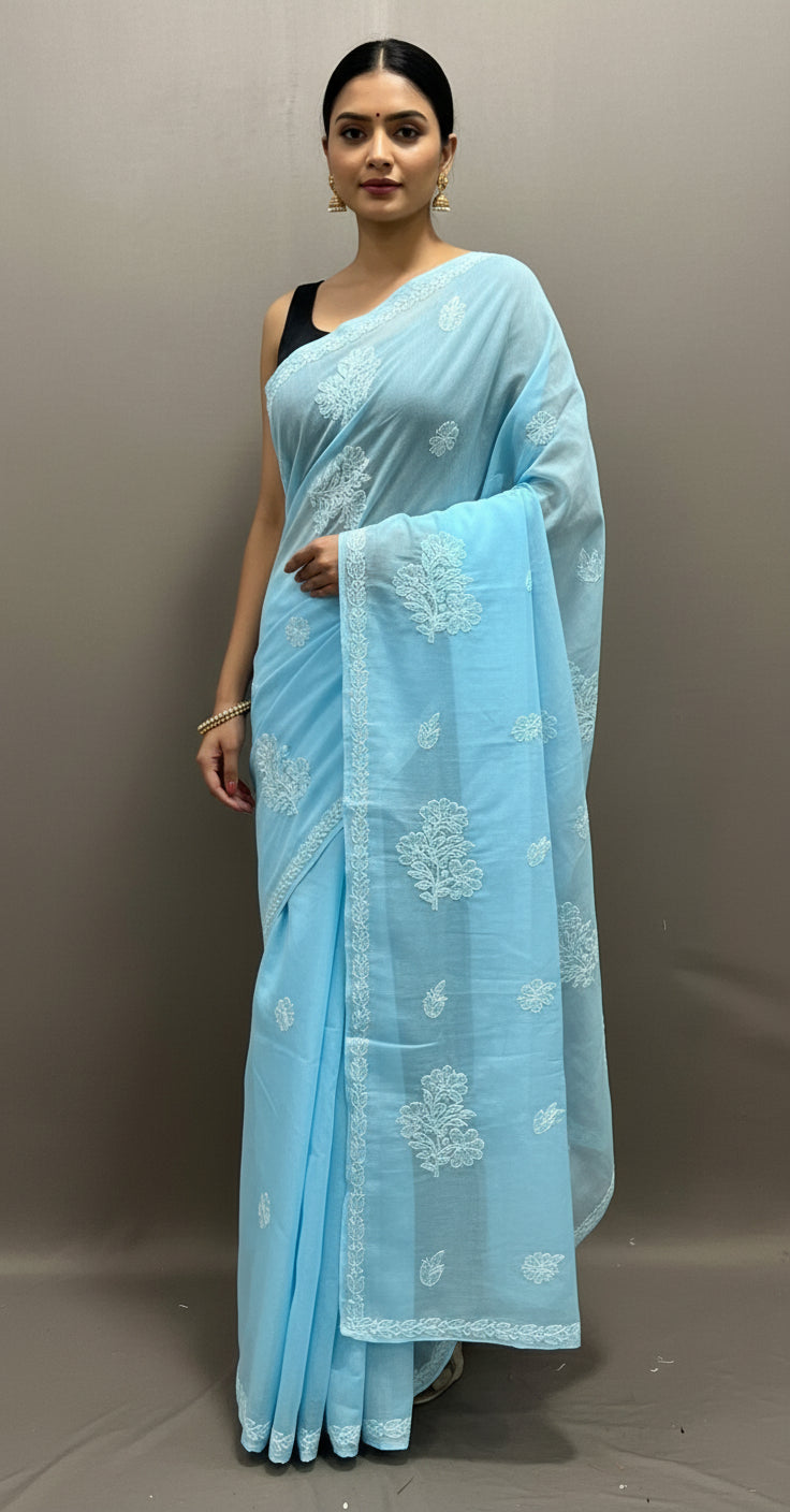 sky blue cotton saree with floral pattern hand embroidery by famaza couture 