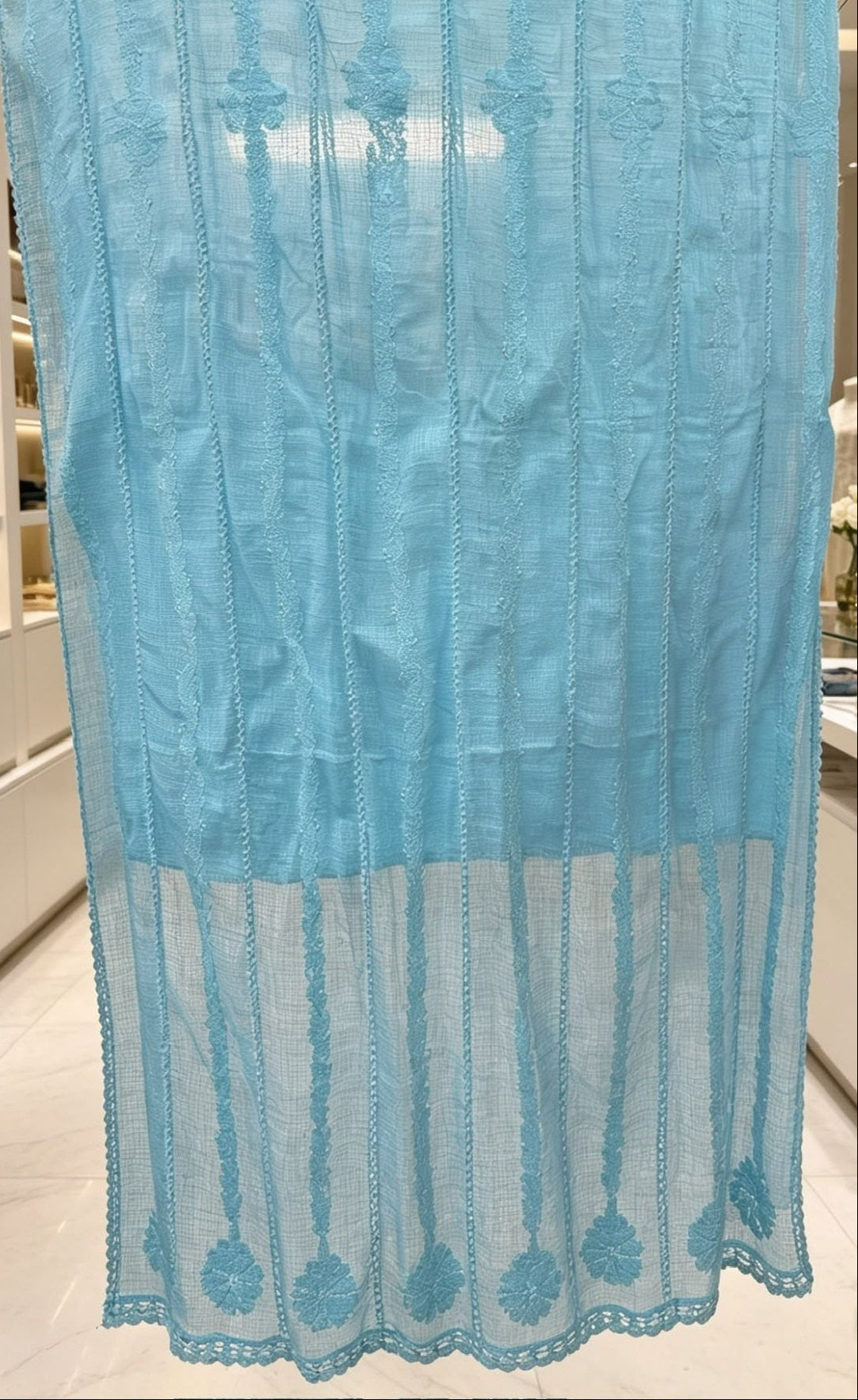 sky blue kota doria duppata is displayed with hand embroidery 
