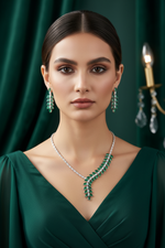 Detailed close-up of the high-grade hydro-emerald green teardrop stones and surrounding marquise-cut American Diamonds.