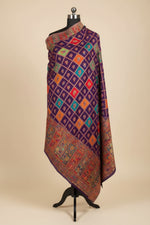 the Fullview of the kanni silk hand crafted duppata displayed on a hanger.