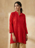 The red short kurti with tone to tone hand embroidery