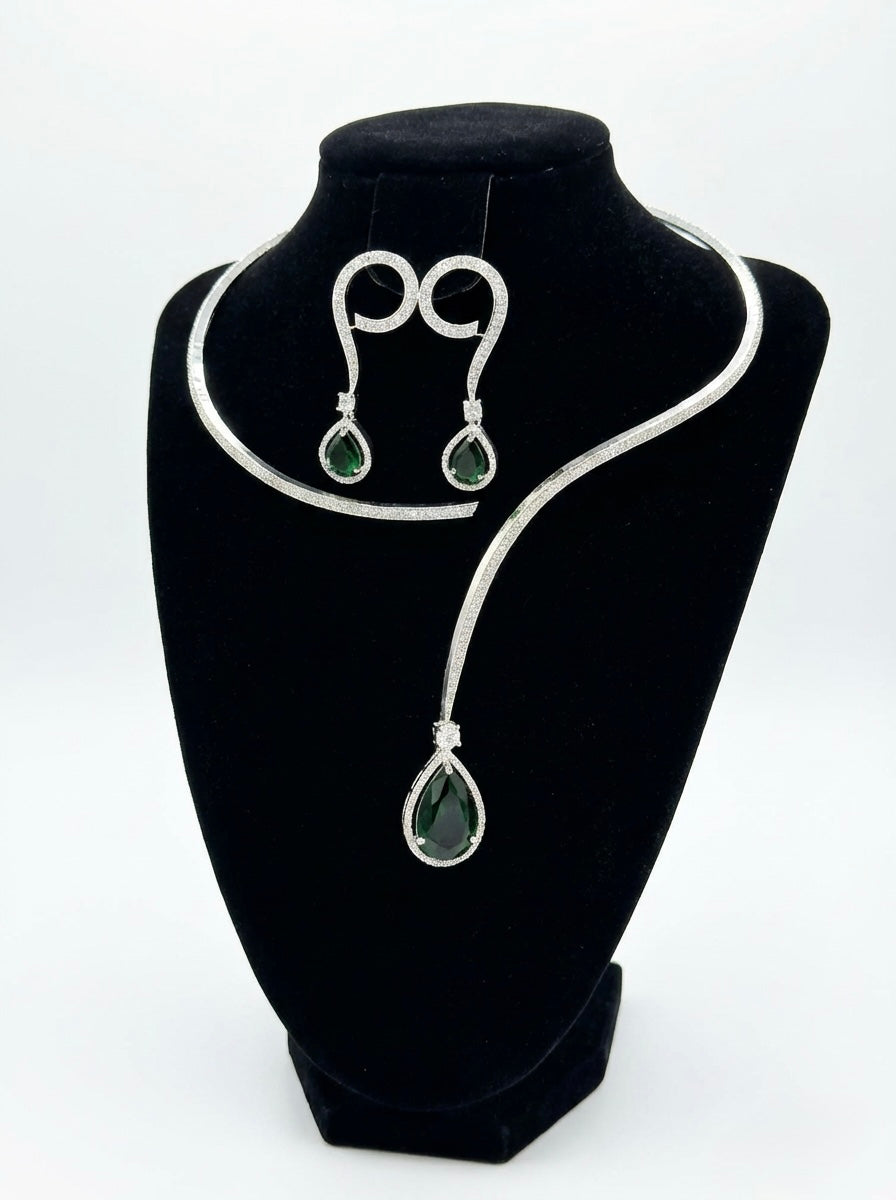 Emerald green and navy blue American diamond collar set on model for luxury bridal