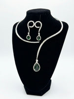 Emerald green and navy blue American diamond collar set on model for luxury bridal