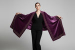 Purple velvet scarf displayed flat, showing floral stone-work borders and corner tassels