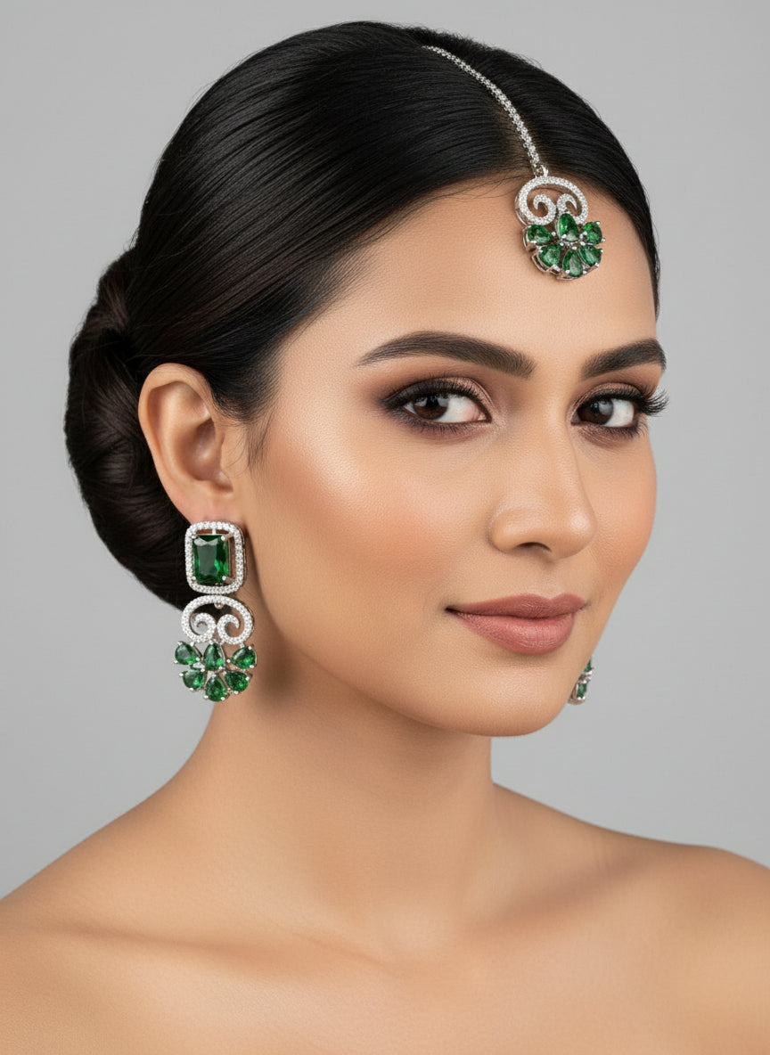 white AD (Artificial Diamond) two earrings and a maang tikka set by famaza couture 
