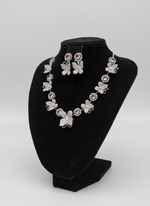 white Nano American diamonds and pink central stone earrings by famaza couture 