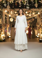 white chikankari dobby cotton flared long dress by famaza couture 