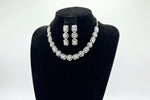 white gemstones with silver plating choker necklace and matching dangling earrings 