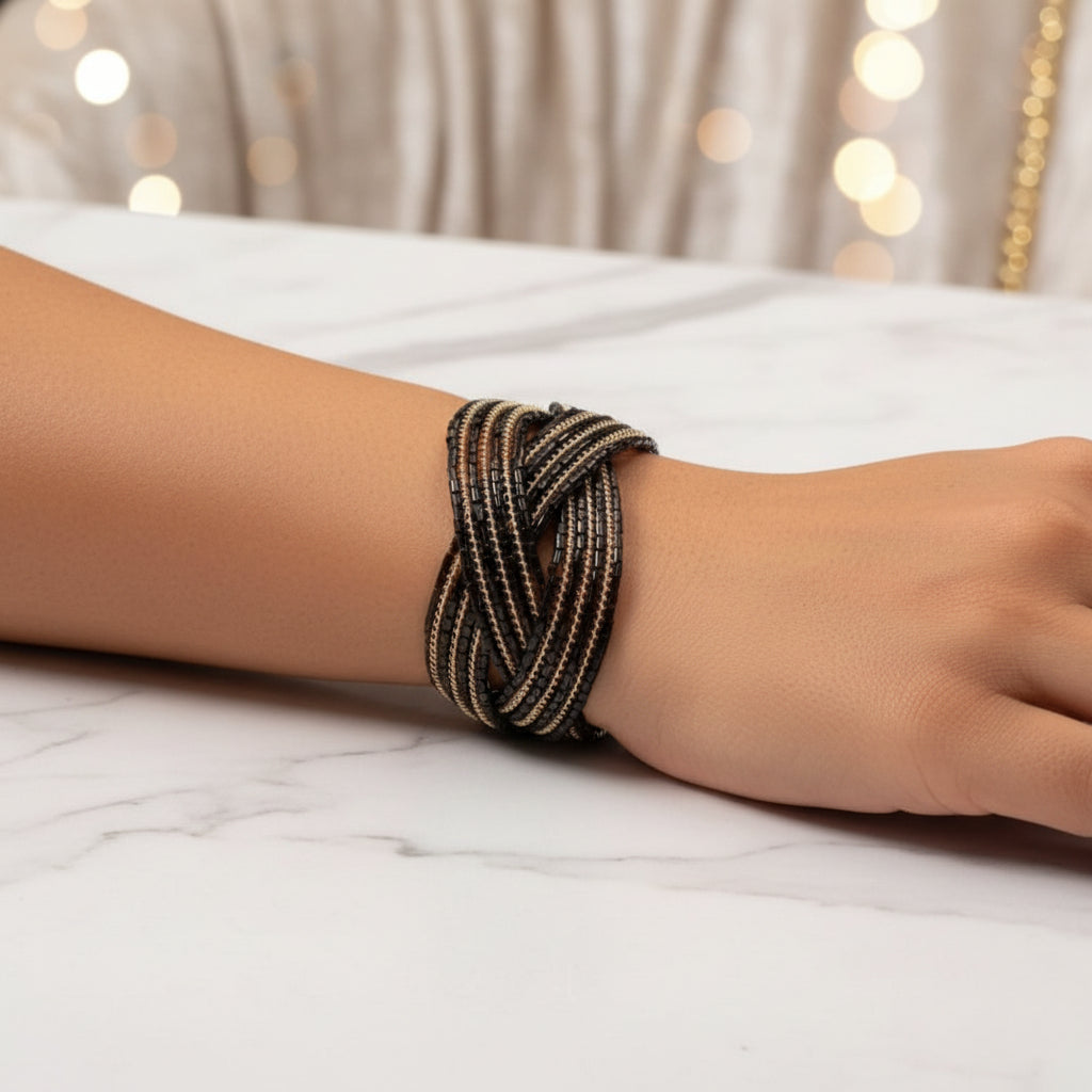 Handmade black and gold glass beaded cuff bracelet for women.